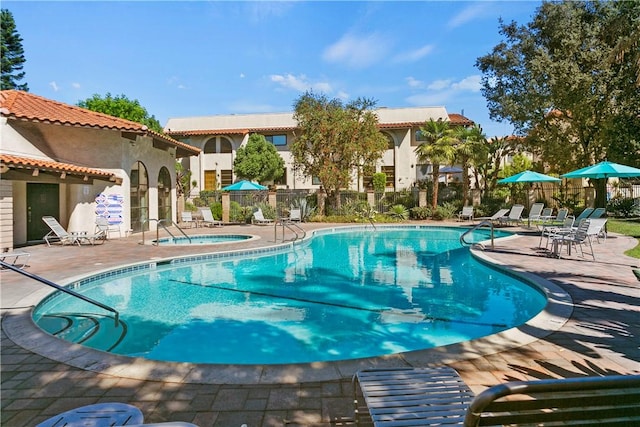 400 S Flower St Unit 84, Orange, CA 92868 - community pool featuring a community hot tub and a patio area