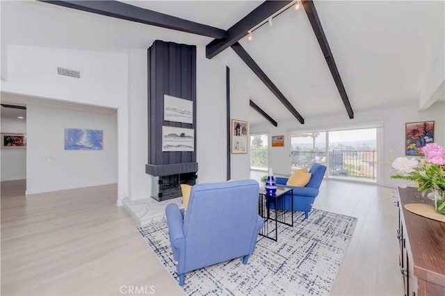 741 W Wedgewood Ln, La Habra, CA 90631 - living room with wood finished floors and track lighting