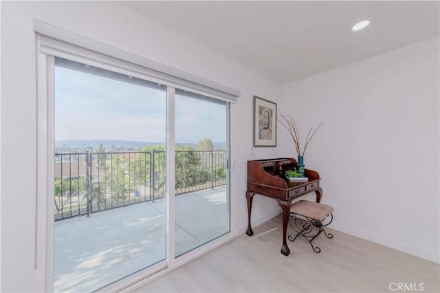 741 W Wedgewood Ln, La Habra, CA 90631 - doorway with light wood finished floors, recessed lighting, and baseboards