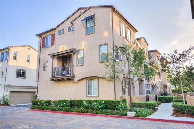 12456 Cassiopeia Ct, Eastvale, CA 91752 - view of property featuring an attached garage and driveway