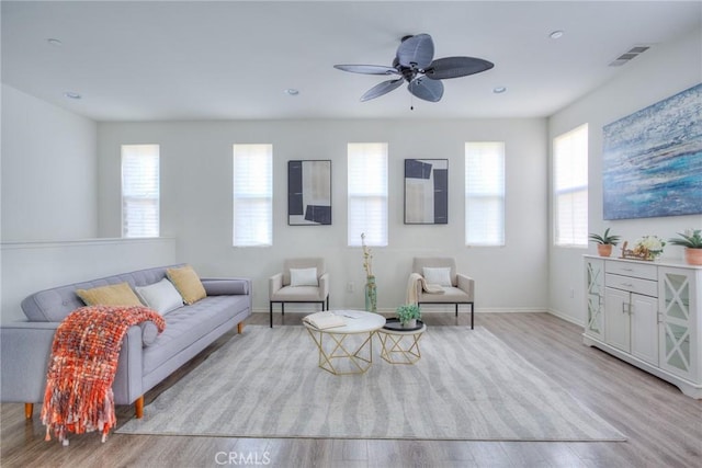 12456 Cassiopeia Ct, Eastvale, CA 91752 - living room featuring wood finished floors, a ceiling fan, and recessed lighting