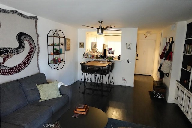 645 Pacific Ave Unit 306, Long Beach, CA 90802 - living area with dark wood-style floors, ceiling fan, and baseboards