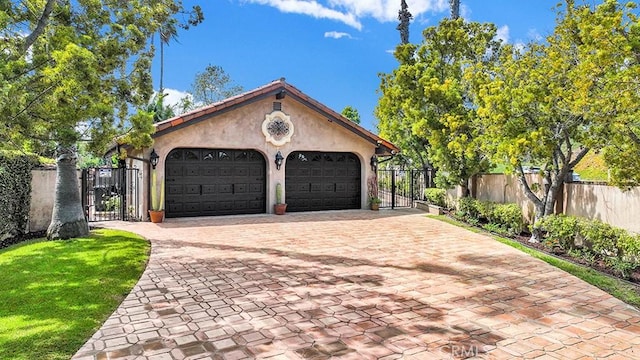 30461 Puerto Vallarta Dr, Laguna Niguel, CA 92677 - garage with a gate and decorative driveway