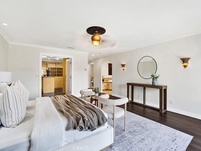 30461 Puerto Vallarta Dr, Laguna Niguel, CA 92677 - bedroom with ornamental molding, baseboards, arched walkways, dark wood-style floors, and recessed lighting