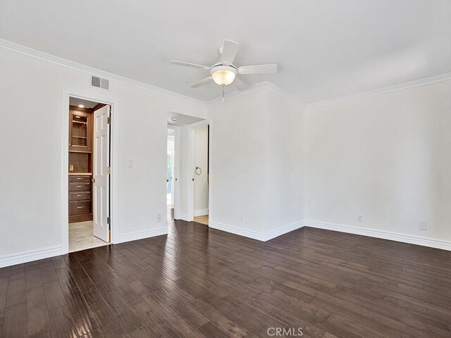 30461 Puerto Vallarta Dr, Laguna Niguel, CA 92677 - empty room with dark wood-style floors, crown molding, ceiling fan, and baseboards