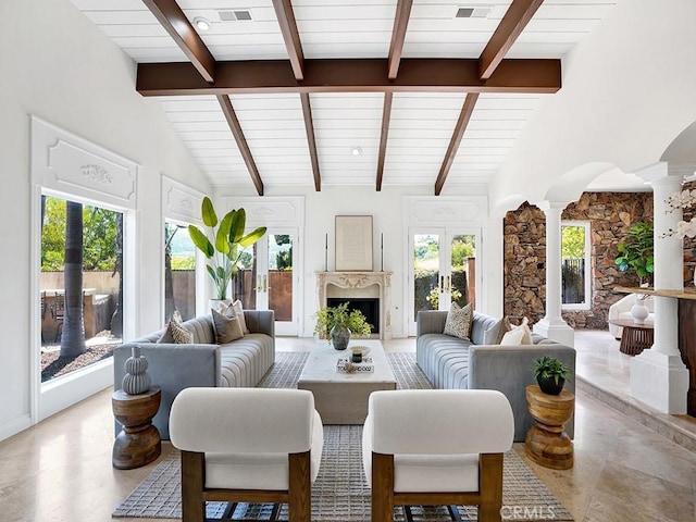 30461 Puerto Vallarta Dr, Laguna Niguel, CA 92677 - living area featuring decorative columns, a fireplace, arched walkways, and wood ceiling
