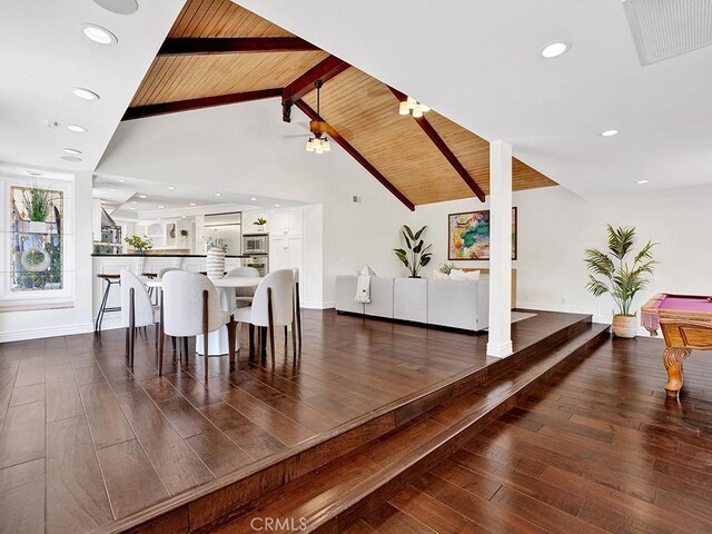 30461 Puerto Vallarta Dr, Laguna Niguel, CA 92677 - dining room featuring beam ceiling, dark wood-type flooring, recessed lighting, baseboards, and high vaulted ceiling