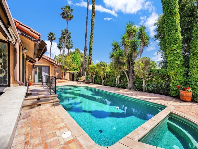 30461 Puerto Vallarta Dr, Laguna Niguel, CA 92677 - outdoor pool featuring an in-ground hot tub, a patio, and a fenced backyard