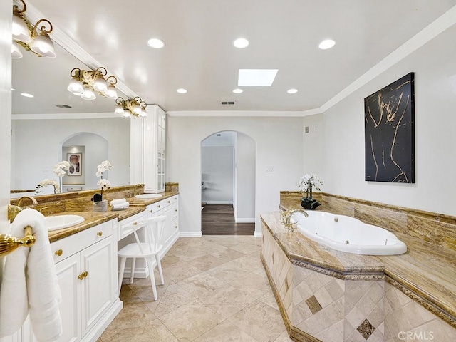 30461 Puerto Vallarta Dr, Laguna Niguel, CA 92677 - full bath featuring double vanity, a whirlpool tub, recessed lighting, ornamental molding, and tile patterned floors