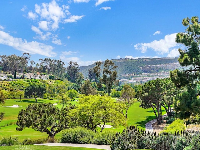 30461 Puerto Vallarta Dr, Laguna Niguel, CA 92677 - view of community featuring view of wooded area, golf course view, a mountain view, and a yard