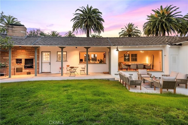 4000 Via Cardelina, Palos Verdes Estates, CA 90274 - back of property featuring an outdoor living space, a chimney, a lawn, a patio, and stucco siding