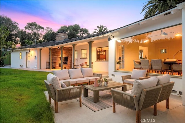 4000 Via Cardelina, Palos Verdes Estates, CA 90274 - rear view of house with an outdoor living space, a chimney, a lawn, stucco siding, and a patio area
