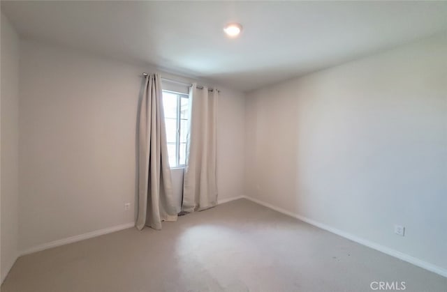 24311 Insignia Dr, Menifee, CA 92584 - spare room with light carpet and baseboards