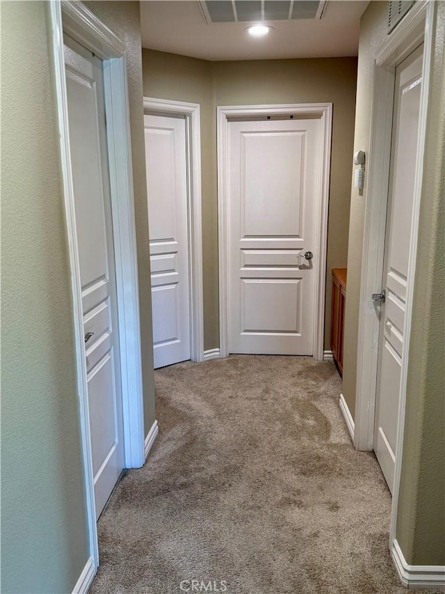 34238 Baja Ct, Lake Elsinore, CA 92532 - hallway with carpet and baseboards