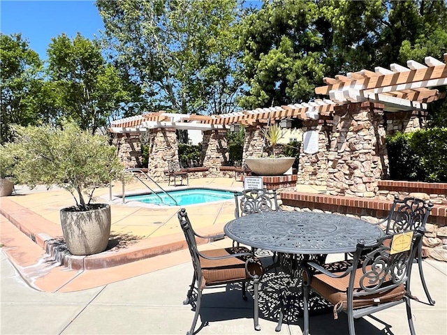 10382 Sparkling Dr Unit 2, Rancho Cucamonga, CA 91730 - view of swimming pool with a pergola, a patio area, a swimming pool, and outdoor dining area