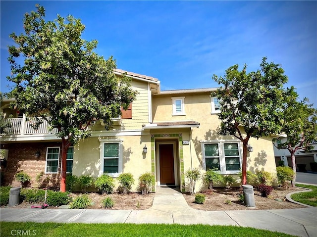 10382 Sparkling Dr Unit 2, Rancho Cucamonga, CA 91730 - view of front facade featuring stucco siding