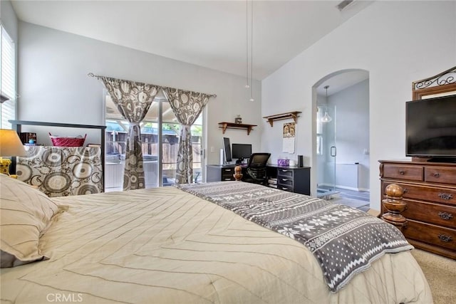3311 Avocado Vista Ln, Fallbrook, CA 92028 - bedroom with arched walkways, access to exterior, multiple windows, and carpet