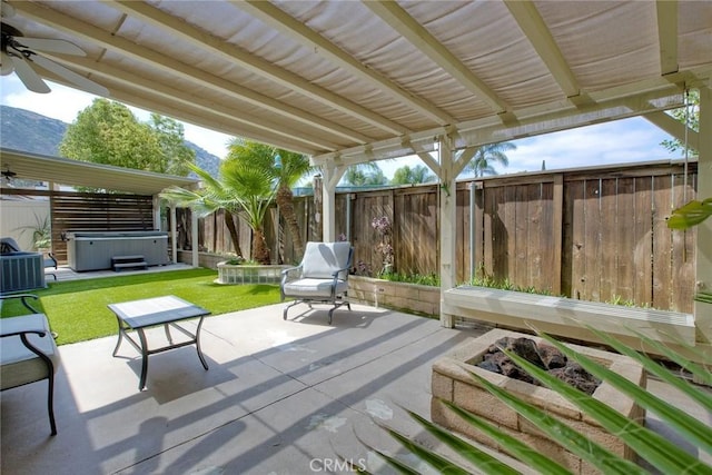 3311 Avocado Vista Ln, Fallbrook, CA 92028 - fenced backyard featuring a hot tub, a patio area, ceiling fan, and central air condition unit