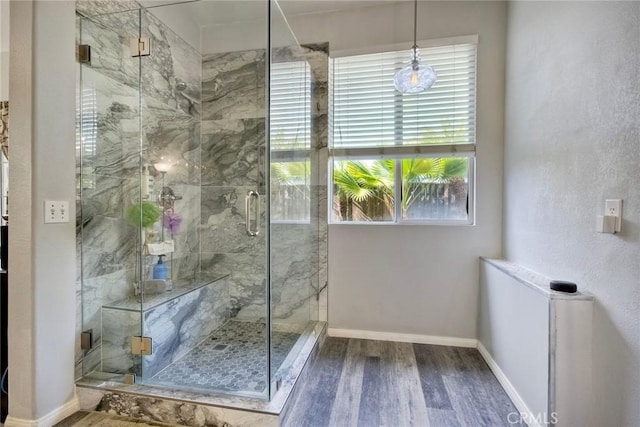 3311 Avocado Vista Ln, Fallbrook, CA 92028 - full bathroom featuring wood finished floors, a marble finish shower, and baseboards