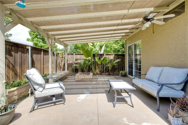 3311 Avocado Vista Ln, Fallbrook, CA 92028 - fenced backyard featuring a patio area, a ceiling fan, and an outdoor hangout area
