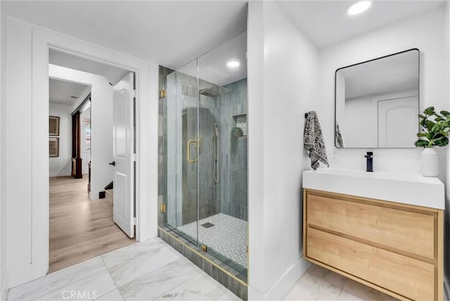 239 N San Antonio Ave, Upland, CA 91786 - full bath with marble finish flooring, baseboards, recessed lighting, a stall shower, and vanity