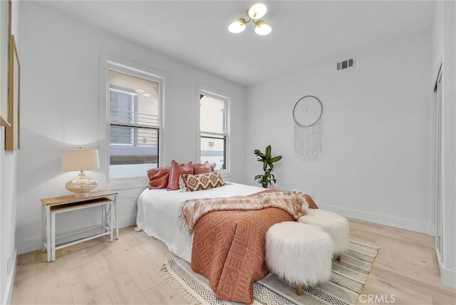 239 N San Antonio Ave, Upland, CA 91786 - bedroom with light wood-type flooring and baseboards