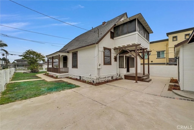 239 N San Antonio Ave, Upland, CA 91786 - rear view of house with a porch and a shingled roof