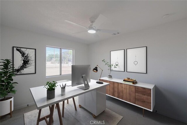 7727 Oakwood Ave, Hesperia, CA 92345 - office area featuring ceiling fan, dark carpet, and baseboards