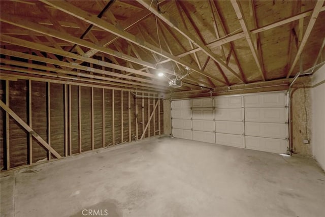 7727 Oakwood Ave, Hesperia, CA 92345 - garage featuring a garage door opener