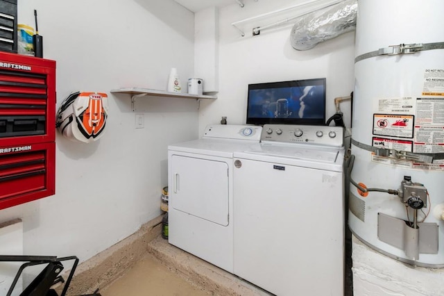 7335 Alicante Rd Unit C, Carlsbad, CA 92009 - laundry room featuring strapped water heater and washing machine and clothes dryer