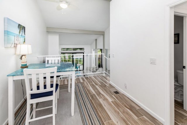 7335 Alicante Rd Unit C, Carlsbad, CA 92009 - dining area with wood tiled floors, baseboards, and a ceiling fan