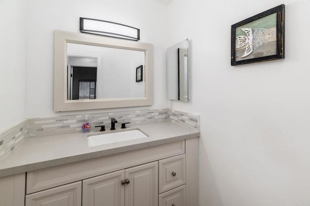 7335 Alicante Rd Unit C, Carlsbad, CA 92009 - bathroom featuring vanity and backsplash