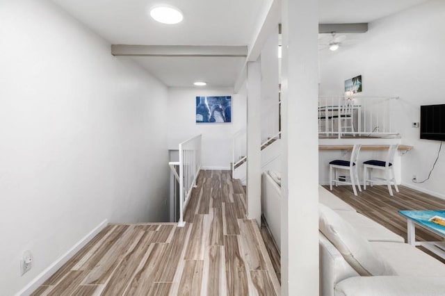 7335 Alicante Rd Unit C, Carlsbad, CA 92009 - hall with an upstairs landing, wood finished floors, and baseboards