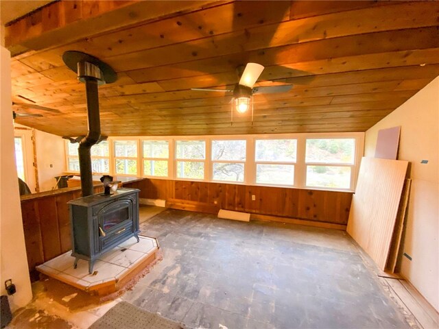 38703 State Highway 96, Klamath River, CA 96086 - sunroom / solarium featuring a wood stove, lofted ceiling, wooden ceiling, and wooden walls