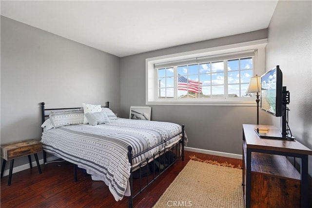 17882 Hallcroft Ln, Huntington Beach, CA 92647 - bedroom featuring baseboards and wood finished floors