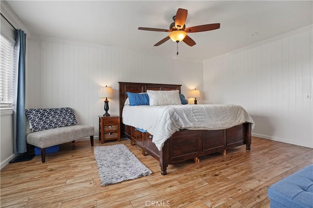 17882 Hallcroft Ln, Huntington Beach, CA 92647 - bedroom with light wood finished floors, ceiling fan, and ornamental molding
