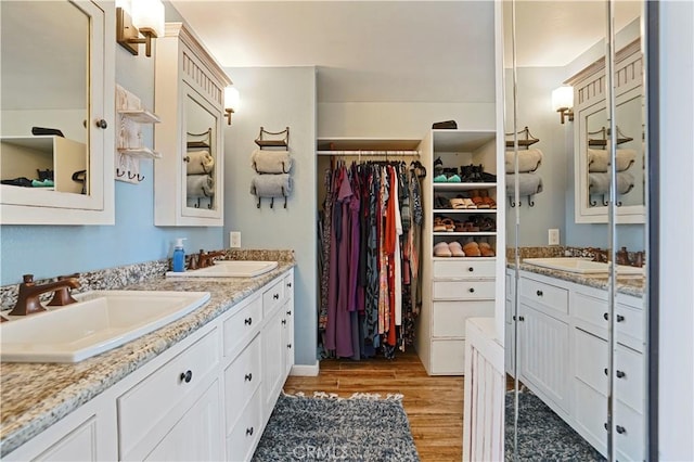 17882 Hallcroft Ln, Huntington Beach, CA 92647 - full bath featuring double vanity, wood finished floors, and a spacious closet
