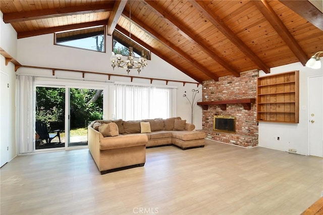 5655 Wish Ave, Encino, CA 91316 - living area with wood ceiling with exposed beams, wood finished floors, high vaulted ceiling, a chandelier, and plenty of natural light
