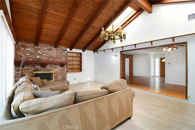 5655 Wish Ave, Encino, CA 91316 - living area with light wood-style floors, wood ceiling with exposed beams, high vaulted ceiling, a fireplace, and ceiling fan