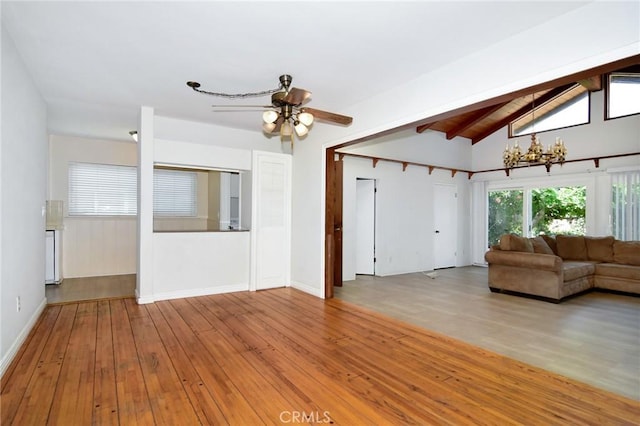 5655 Wish Ave, Encino, CA 91316 - living room with a chandelier, wood-type flooring, a ceiling fan, and baseboards