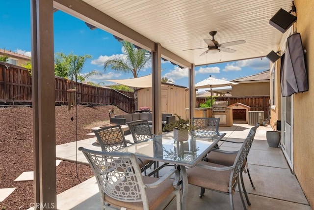 29463 Bouris Dr, Menifee, CA 92584 - fenced backyard with outdoor dining area, ceiling fan, a patio area, and central AC unit