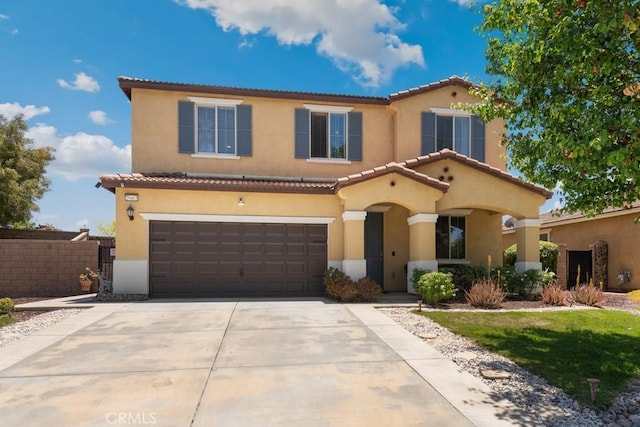 29463 Bouris Dr, Menifee, CA 92584 - mediterranean / spanish-style home featuring an attached garage, stucco siding, driveway, and a tiled roof