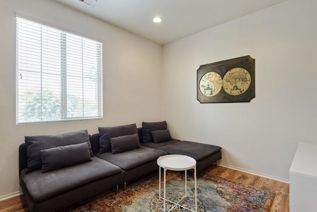 29463 Bouris Dr, Menifee, CA 92584 - living room featuring wood finished floors, baseboards, and recessed lighting