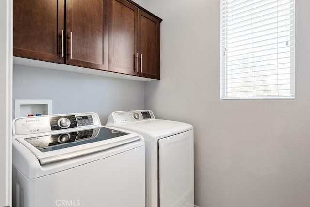 29463 Bouris Dr, Menifee, CA 92584 - laundry room featuring cabinet space and washing machine and clothes dryer