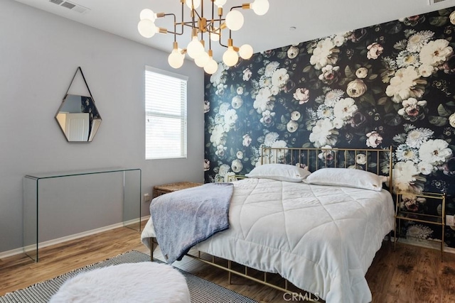 29463 Bouris Dr, Menifee, CA 92584 - bedroom with a chandelier, wood finished floors, and baseboards