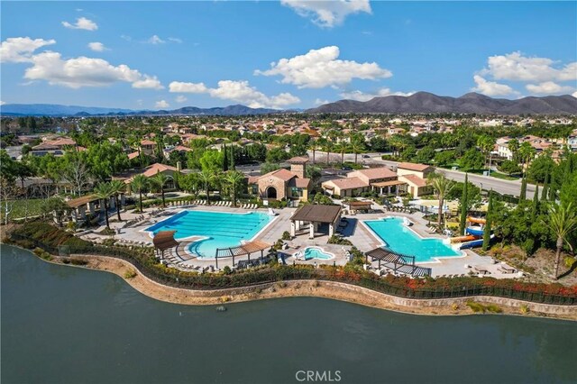 29463 Bouris Dr, Menifee, CA 92584 - aerial perspective of suburban area with a pool and a mountain backdrop
