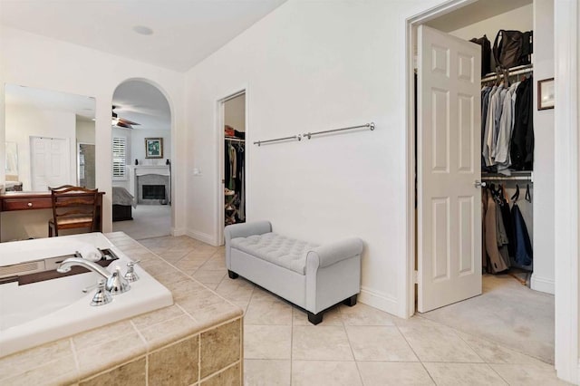 1327 Silver Hawk Way, Chula Vista, CA 91915 - full bath featuring a spacious closet, a ceiling fan, a fireplace, a garden tub, and connected bathroom