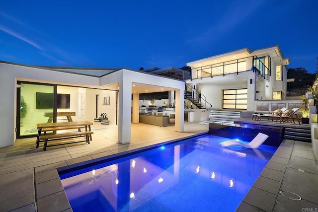 537 N Granados Ave, Solana Beach, CA 92075 - rear view of house with stairs, an outdoor hangout area, stucco siding, an outdoor pool, and a patio area