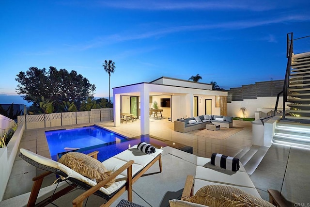 537 N Granados Ave, Solana Beach, CA 92075 - pool at dusk with an outdoor hangout area, stairs, a fenced backyard, an outdoor structure, and a patio area