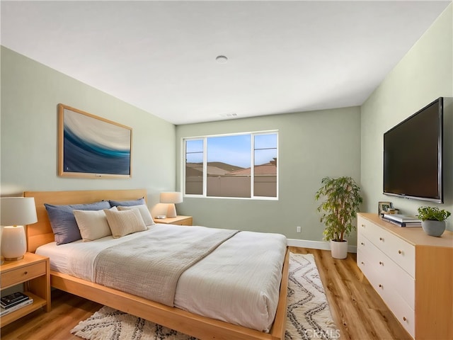 27117 Great Plains Ct, Menifee, CA 92585 - bedroom featuring light wood-style flooring and baseboards